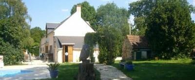 TE KOOP<br />tot groot woonhuis verbouwde boerderij met zwembad